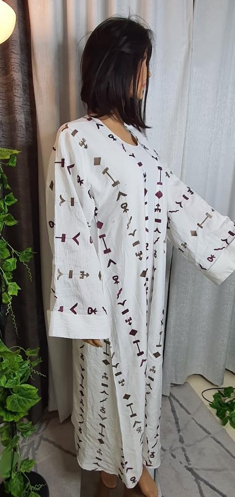 عباية بفستان داخلي