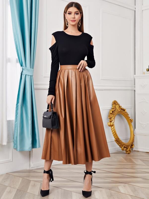 شي ان | تنورة من الجلد الصناعي بطيات